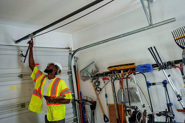 Professional Garage Door Panel Replacement technician working in Reed City, MI